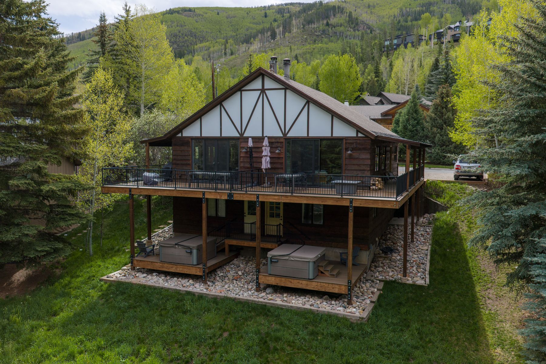 Tudor facade against the aspen hillside