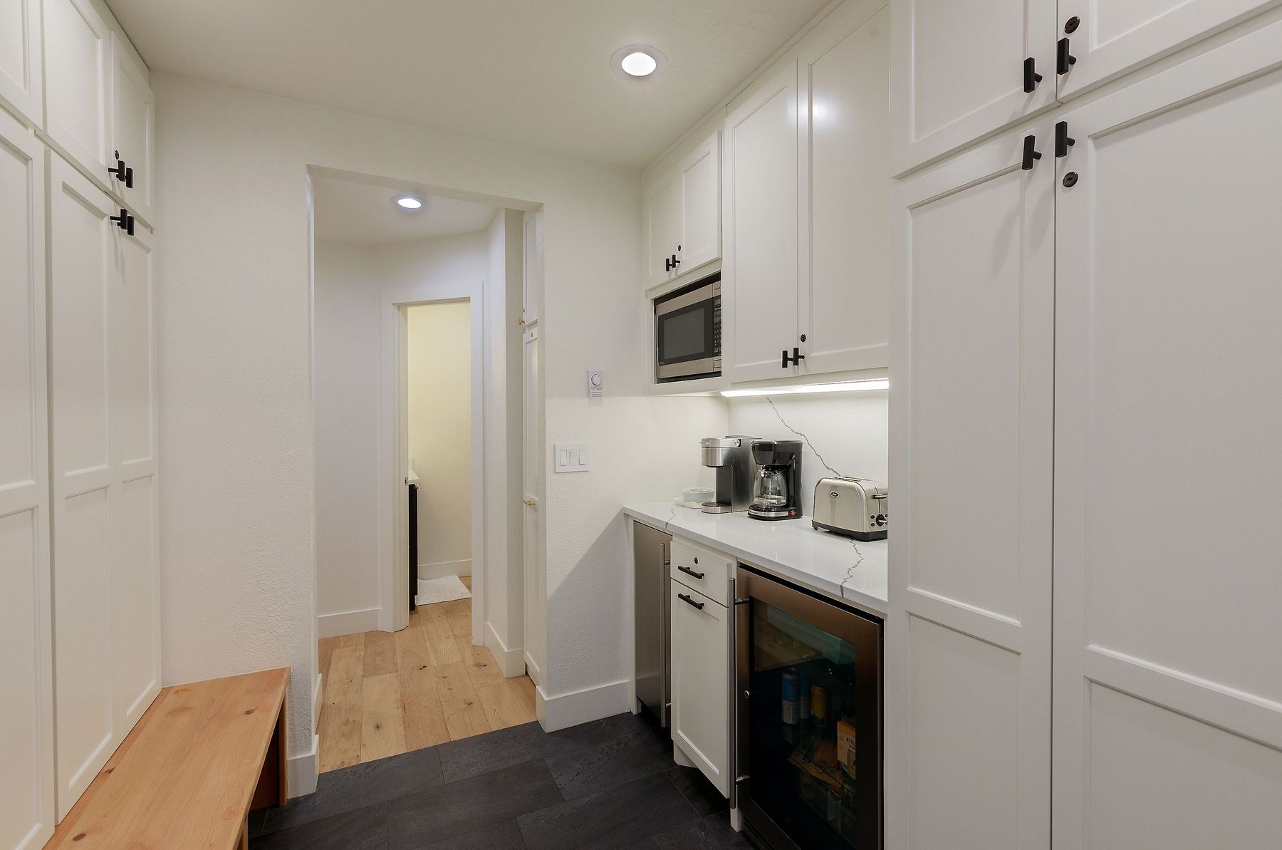 Coffee bar with under-counter beverage fridge