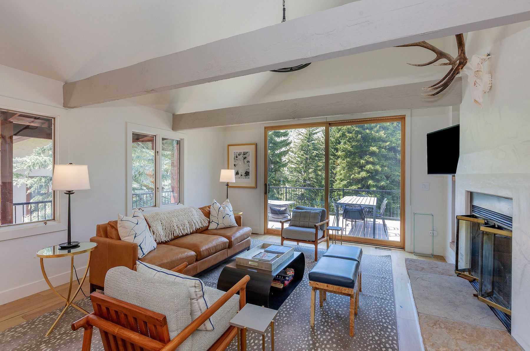 Living area with sliding doors to the deck