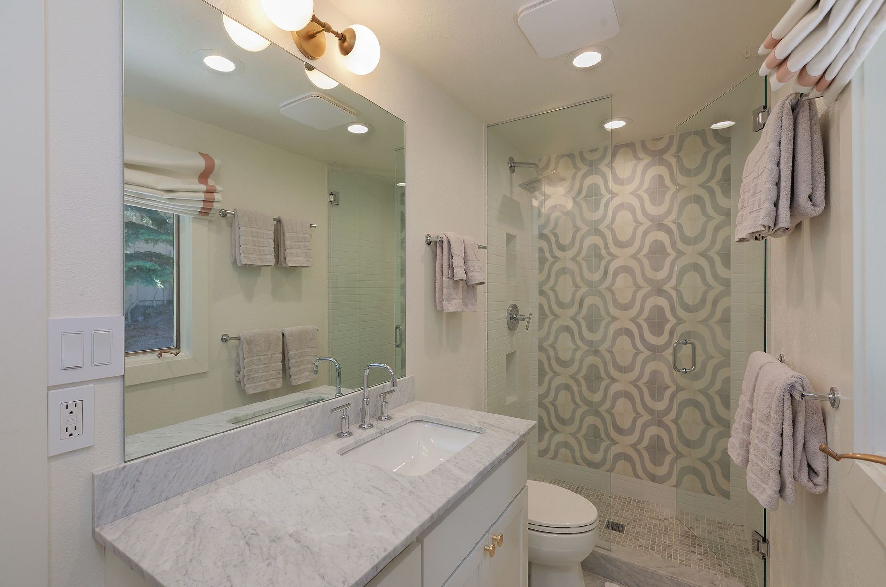 Full bath with statement-tile walk-in shower