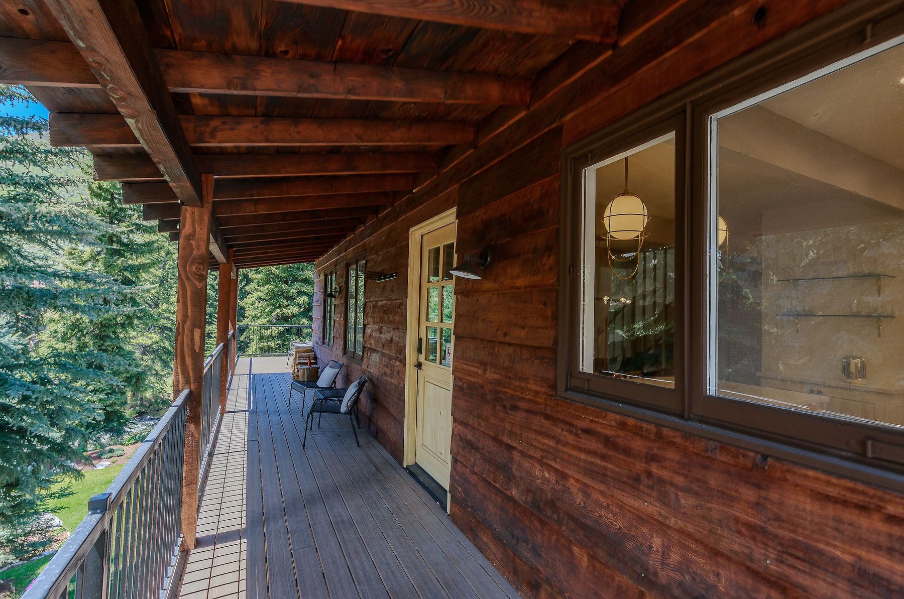 Covered porch with creek-side outlook